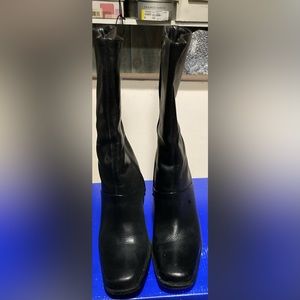 Black size 8 mid calf leather boots.